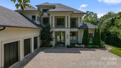 Nestled along the pristine shores of Lake Norman, this on The Peninsula Club in North Carolina - for sale on GolfHomes.com, golf home, golf lot