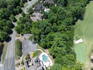 Stunning half acre homesite that backs up to the first hole of on The Palisades Country Club in North Carolina - for sale on GolfHomes.com, golf home, golf lot