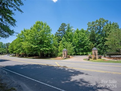 Stunning half acre homesite that backs up to the first hole of on The Palisades Country Club in North Carolina - for sale on GolfHomes.com, golf home, golf lot