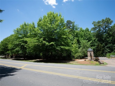 Stunning half acre homesite that backs up to the first hole of on The Palisades Country Club in North Carolina - for sale on GolfHomes.com, golf home, golf lot