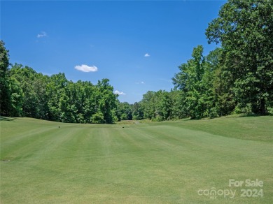 Stunning half acre homesite that backs up to the first hole of on The Palisades Country Club in North Carolina - for sale on GolfHomes.com, golf home, golf lot