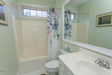 Gorgeous low-maintenance brick home backing up to the par 5 16th on Ocean Ridge Plantation in North Carolina - for sale on GolfHomes.com, golf home, golf lot