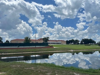 LOCATED IN HIGHLY SOUGHT FIVE-STAR COMMUNITY FOUR LAKES GOLF on Four Lakes Golf Club in Florida - for sale on GolfHomes.com, golf home, golf lot