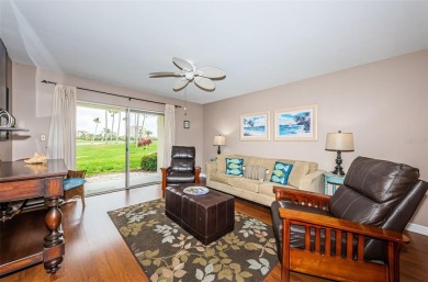 This ground-floor condo with 2 bedrooms and 2 bathrooms embodies on Isla Del Sol Yacht and Country Club in Florida - for sale on GolfHomes.com, golf home, golf lot