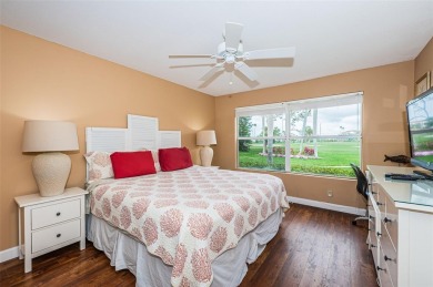 This ground-floor condo with 2 bedrooms and 2 bathrooms embodies on Isla Del Sol Yacht and Country Club in Florida - for sale on GolfHomes.com, golf home, golf lot
