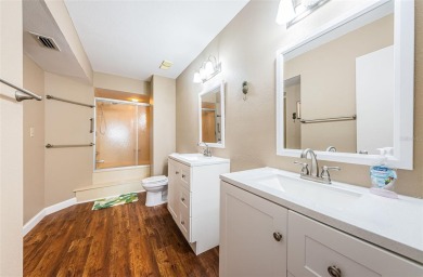 This ground-floor condo with 2 bedrooms and 2 bathrooms embodies on Isla Del Sol Yacht and Country Club in Florida - for sale on GolfHomes.com, golf home, golf lot