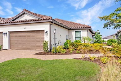 This exquisite Ibis villa is your opportunity to own a slice of on Esplanade Golf and Country at Lakewood Ranch in Florida - for sale on GolfHomes.com, golf home, golf lot