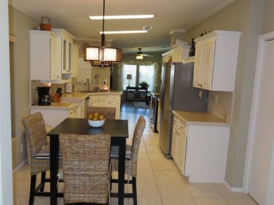 his great home is located on an oversized corner lot. The 18 x on Crane Lakes Golf and Country Club in Florida - for sale on GolfHomes.com, golf home, golf lot