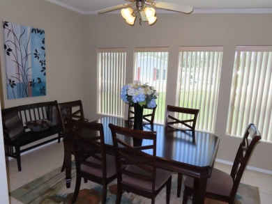his great home is located on an oversized corner lot. The 18 x on Crane Lakes Golf and Country Club in Florida - for sale on GolfHomes.com, golf home, golf lot