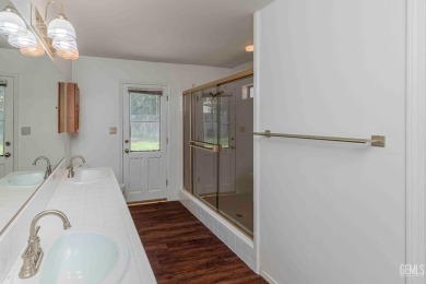 This incredible home in a serene NW neighborhood boasts OWNED on The Links At Riverlakes Ranch in California - for sale on GolfHomes.com, golf home, golf lot