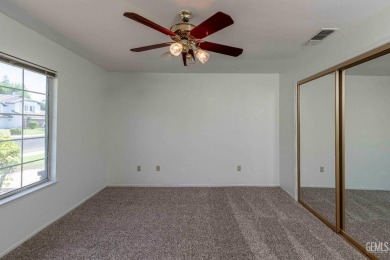 This incredible home in a serene NW neighborhood boasts OWNED on The Links At Riverlakes Ranch in California - for sale on GolfHomes.com, golf home, golf lot
