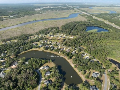 Your Coastal Georgia dream home awaits! Perfectly nestled in the on The Golf Club At Sanctuary Cove in Georgia - for sale on GolfHomes.com, golf home, golf lot