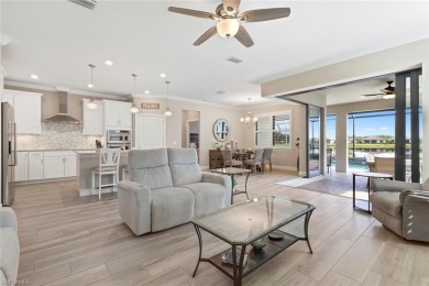 GOLF MEMBERSHIP, POOL and STUNNING WATER VIEW! This home has it on Panther Run Golf Club in Florida - for sale on GolfHomes.com, golf home, golf lot