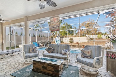 Experience timeless design, modern upgrades, and effortless on Oak Hills Country Club in Florida - for sale on GolfHomes.com, golf home, golf lot