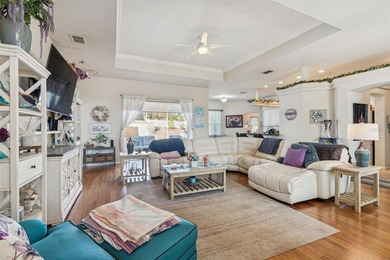 Experience timeless design, modern upgrades, and effortless on Oak Hills Country Club in Florida - for sale on GolfHomes.com, golf home, golf lot