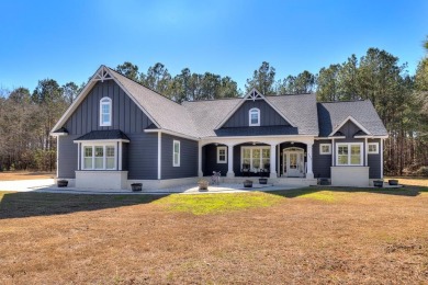 This impeccable home with detailed custom features is a must on Players Course At Wyboo Plantation in South Carolina - for sale on GolfHomes.com, golf home, golf lot