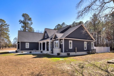 This impeccable home with detailed custom features is a must on Players Course At Wyboo Plantation in South Carolina - for sale on GolfHomes.com, golf home, golf lot