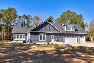 This impeccable home with detailed custom features is a must on Players Course At Wyboo Plantation in South Carolina - for sale on GolfHomes.com, golf home, golf lot