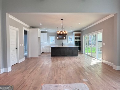**Stunning New Construction with Owner's Suite on Main & Outdoor on Traditions of Braselton Golf Club in Georgia - for sale on GolfHomes.com, golf home, golf lot