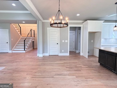 **Stunning New Construction with Owner's Suite on Main & Outdoor on Traditions of Braselton Golf Club in Georgia - for sale on GolfHomes.com, golf home, golf lot