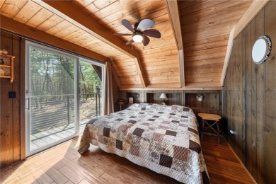 Impressively updated and meticulously maintained A-frame on Voyager Village Country Club - Voyager in Wisconsin - for sale on GolfHomes.com, golf home, golf lot