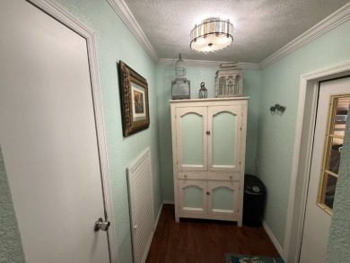 This well cared for home is being sold unfurnished.  As you on Del Tura Golf and Country Club in Florida - for sale on GolfHomes.com, golf home, golf lot