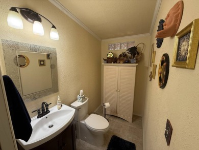 This well cared for home is being sold unfurnished.  As you on Del Tura Golf and Country Club in Florida - for sale on GolfHomes.com, golf home, golf lot