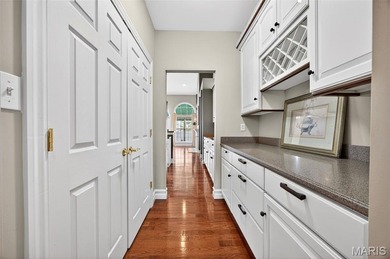 Experience elegant living in this stunning villa located in the on Winghaven Country Club in Missouri - for sale on GolfHomes.com, golf home, golf lot