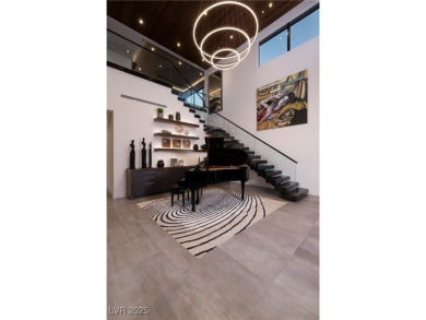 Discover this extraordinary home by award-winning Christopher on Dragon Ridge Country Club in Nevada - for sale on GolfHomes.com, golf home, golf lot
