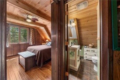 Impressively updated and meticulously maintained A-frame on Voyager Village Country Club - Voyager in Wisconsin - for sale on GolfHomes.com, golf home, golf lot