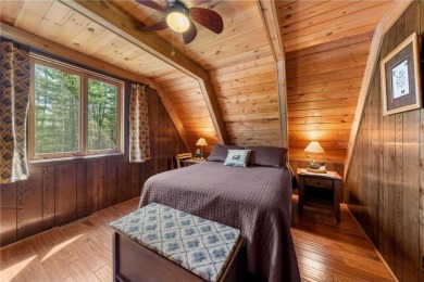 Impressively updated and meticulously maintained A-frame on Voyager Village Country Club - Voyager in Wisconsin - for sale on GolfHomes.com, golf home, golf lot
