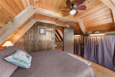 Impressively updated and meticulously maintained A-frame on Voyager Village Country Club - Voyager in Wisconsin - for sale on GolfHomes.com, golf home, golf lot