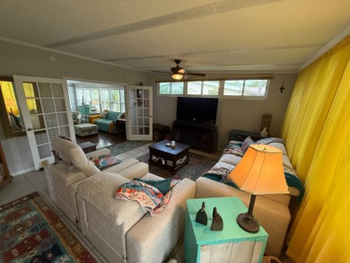 This well cared for home is being sold unfurnished.  As you on Del Tura Golf and Country Club in Florida - for sale on GolfHomes.com, golf home, golf lot