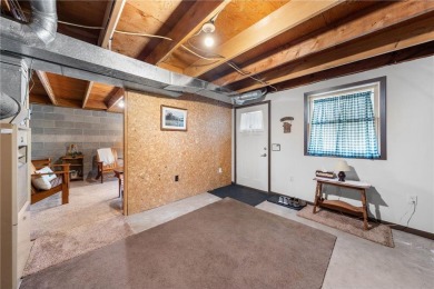 Impressively updated and meticulously maintained A-frame on Voyager Village Country Club - Voyager in Wisconsin - for sale on GolfHomes.com, golf home, golf lot