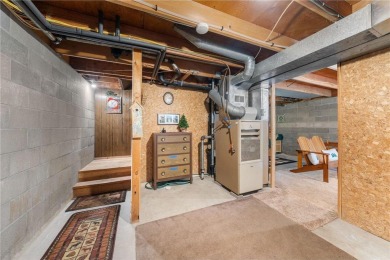 Impressively updated and meticulously maintained A-frame on Voyager Village Country Club - Voyager in Wisconsin - for sale on GolfHomes.com, golf home, golf lot