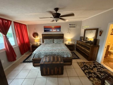 This well cared for home is being sold unfurnished.  As you on Del Tura Golf and Country Club in Florida - for sale on GolfHomes.com, golf home, golf lot