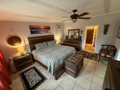 This well cared for home is being sold unfurnished.  As you on Del Tura Golf and Country Club in Florida - for sale on GolfHomes.com, golf home, golf lot
