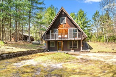 Impressively updated and meticulously maintained A-frame on Voyager Village Country Club - Voyager in Wisconsin - for sale on GolfHomes.com, golf home, golf lot