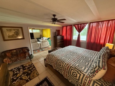 This well cared for home is being sold unfurnished.  As you on Del Tura Golf and Country Club in Florida - for sale on GolfHomes.com, golf home, golf lot