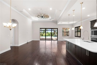 A Move-In-Ready Masterpiece with Stunning Water  Golf Views in on Spanish Wells Golf and Country Club in Florida - for sale on GolfHomes.com, golf home, golf lot