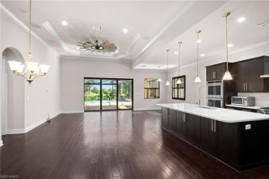 A Move-In-Ready Masterpiece with Stunning Water  Golf Views in on Spanish Wells Golf and Country Club in Florida - for sale on GolfHomes.com, golf home, golf lot
