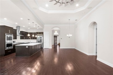A Move-In-Ready Masterpiece with Stunning Water  Golf Views in on Spanish Wells Golf and Country Club in Florida - for sale on GolfHomes.com, golf home, golf lot