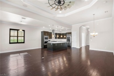 A Move-In-Ready Masterpiece with Stunning Water  Golf Views in on Spanish Wells Golf and Country Club in Florida - for sale on GolfHomes.com, golf home, golf lot