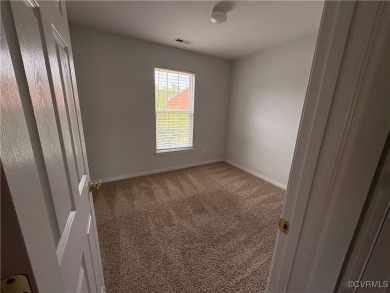 Welcome to this spacious and well-appointed townhome in the on The Tradition Golf Club At The Crossings in Virginia - for sale on GolfHomes.com, golf home, golf lot