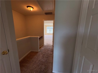 Welcome to this spacious and well-appointed townhome in the on The Tradition Golf Club At The Crossings in Virginia - for sale on GolfHomes.com, golf home, golf lot