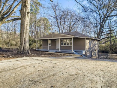 Seller Financing Available! Minimum 10% down. This full remodel on Browns Mill Golf Course in Georgia - for sale on GolfHomes.com, golf home, golf lot