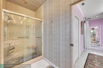 3 BEDROOM/2BATH THIS CHARMING, WELL KEPT HOME IS SITUATED IN A on Boca Greens Country Club in Florida - for sale on GolfHomes.com, golf home, golf lot
