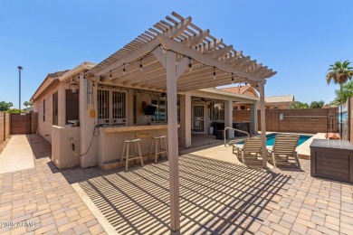 BACKYARD OASIS PRIVATE POOL AND SPA- Beautiful home in a gated on Arizona Traditions Golf Club in Arizona - for sale on GolfHomes.com, golf home, golf lot