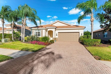 RESORT STYLE LIVING WITH STUNNING WATER VIEWS - 3BR/2BA in Gated on River Strand Golf and Country Club At Heritage Harbour  in Florida - for sale on GolfHomes.com, golf home, golf lot