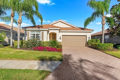 RESORT STYLE LIVING WITH STUNNING WATER VIEWS - 3BR/2BA in Gated on River Strand Golf and Country Club At Heritage Harbour  in Florida - for sale on GolfHomes.com, golf home, golf lot